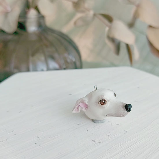 dog greyhound whippet white pendant turn table